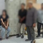 Wanita Ditemani Petugas karena Bawa Mayat Bayi dari Malaysia